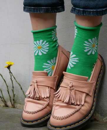Chaussettes hautes motifs marguerites roulottées -